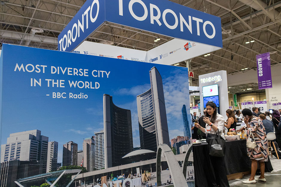 Busy Toronto booth showing the quote 'Most diverse city in the world' – BBC Radio