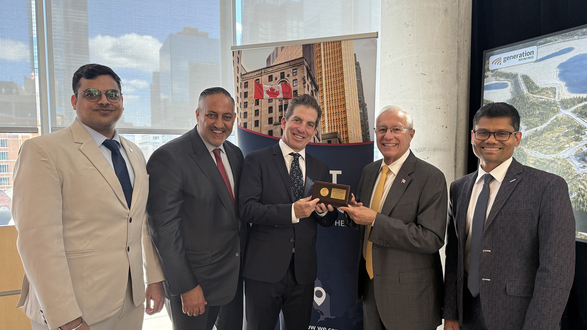 Minister Fedeli and the Invest Ontario team present Generation Mining CEO Jamie Levy with a commemorative plaque.