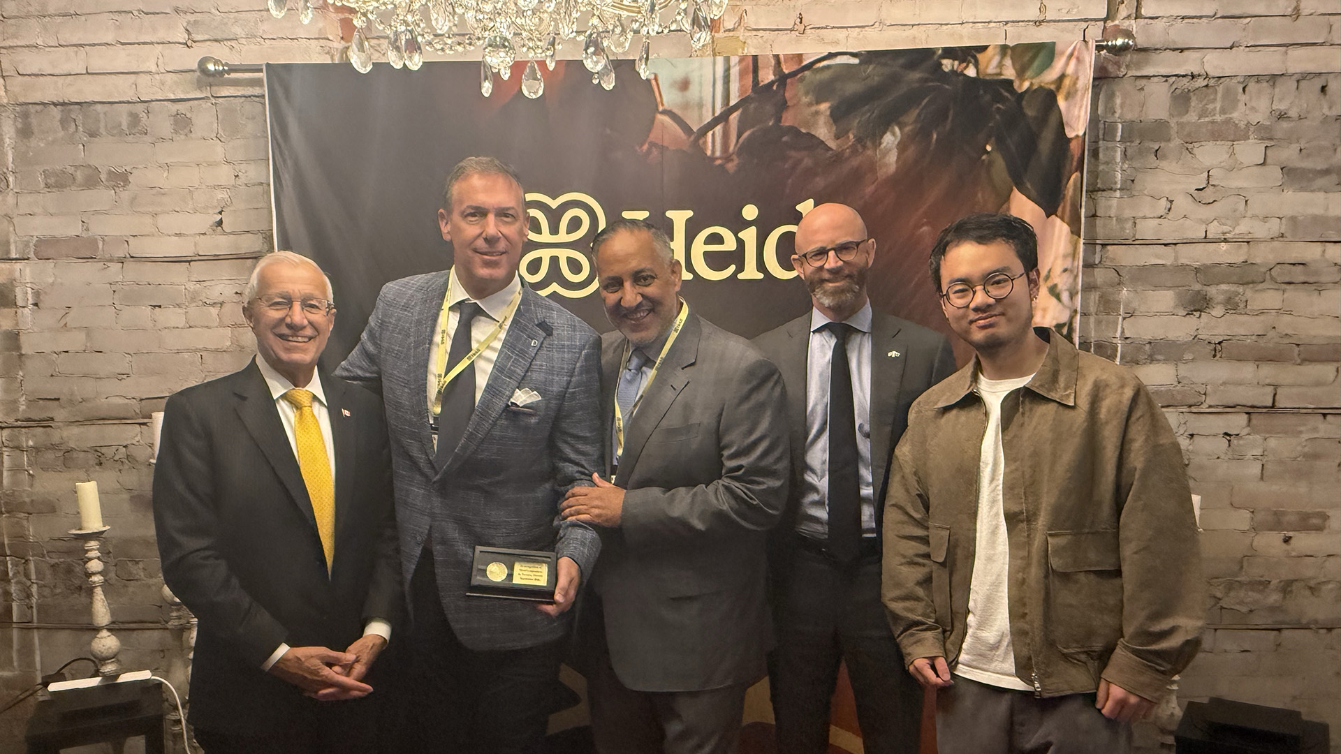 Group photo featuring, from left to right: Minister Vic Fedeli; Mark Leno, General Manager, Heidi Canada; Khawar Nasim, CEO, Invest Ontario; Garrett Tone, Executive Director, Life Sciences, Invest Ontario; and Yu Liu, Co-Founder and CTO, Heidi.