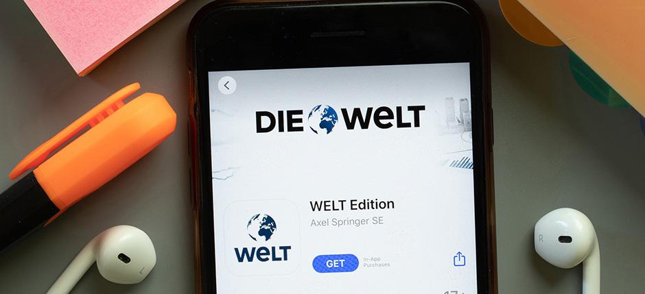 Un téléphone portable avec une image de l'application Die Welt